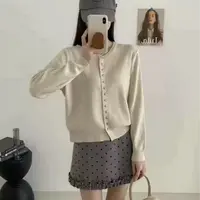 简约时尚花纱六边形纽扣开衫长袖S093