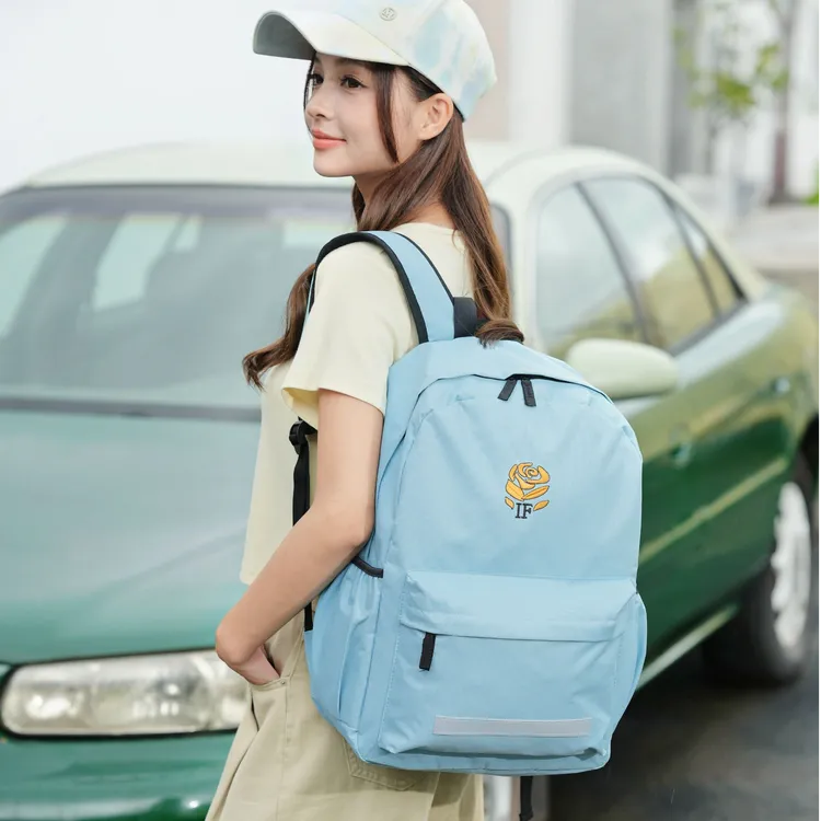 简约风四叶草透气双肩成人背包书包百搭大学生高中生欧若智性风