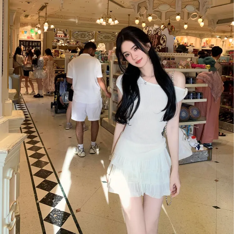韩系甜美少女2025夏季新款纽结斜肩收腰短袖上衣搭配高腰短裙套装