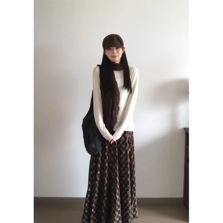 2025秋季新款女圆领长袖显瘦百搭小众镂空气质上衣格子法式半身裙