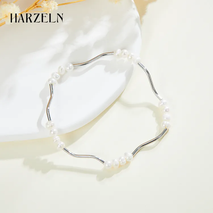 新款异形淡水珍珠拼接手链女冷淡风波浪弯多层叠戴简约轻奢手串