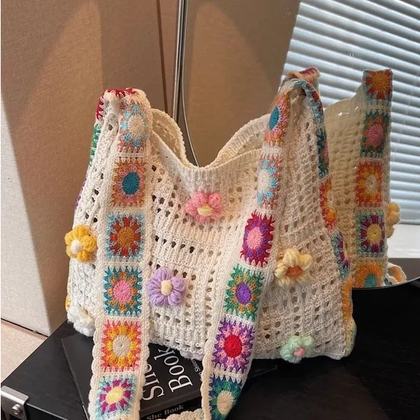 毛线编织太阳花包女2025新款大容量单肩包清新海边度假斜挎包7411