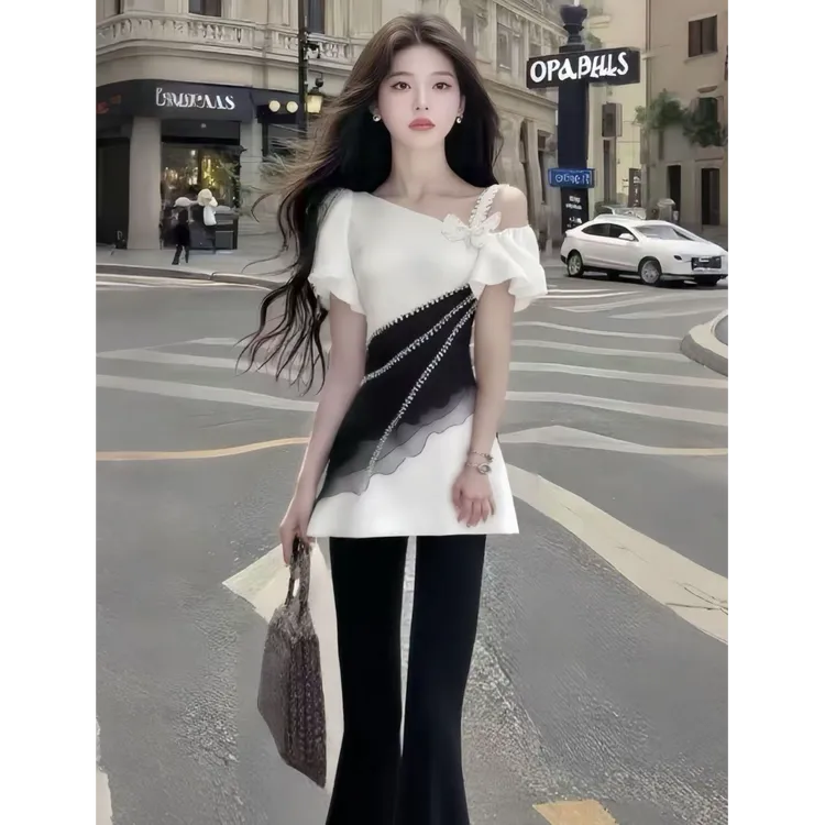 白色斜肩性感拼接辣妹上衣修身裤子设计感显瘦气质名媛夏季轻奢