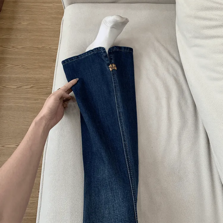 韩系设计感侧开叉遮肉微喇牛仔裤秋季大码高腰蝴蝶结不贴腿喇叭裤