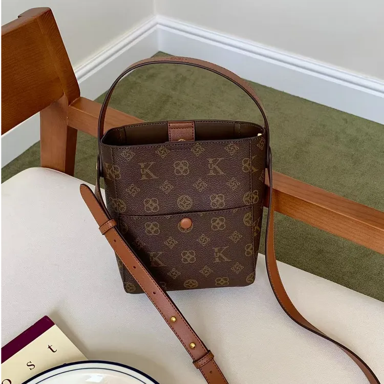 优库迪斯UK时尚百搭单肩斜挎手提水桶包（UK96286）