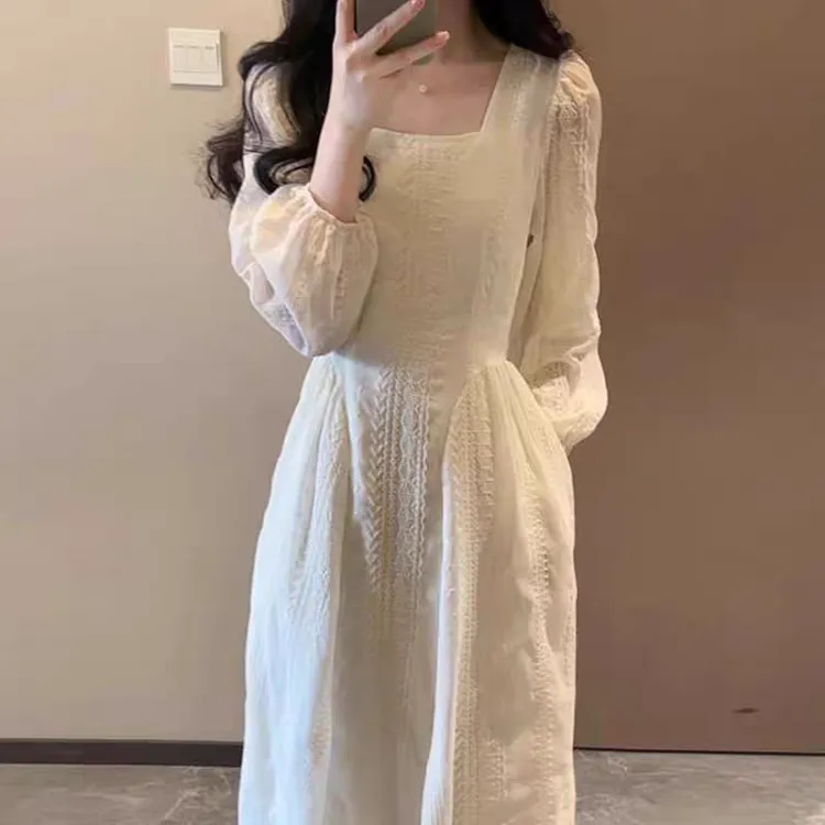 2025新款温柔风重工蕾丝连衣裙子女早秋季法式初恋系白色收腰长裙