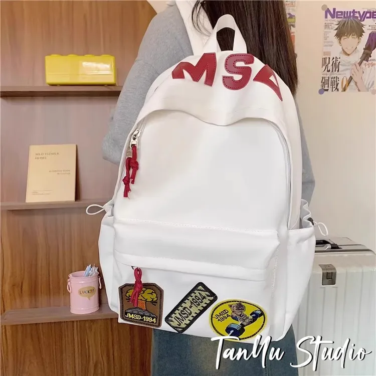 探屿美式水纹涂鸦高颜值设计通勤旅行高级感高中大学上课双肩书包