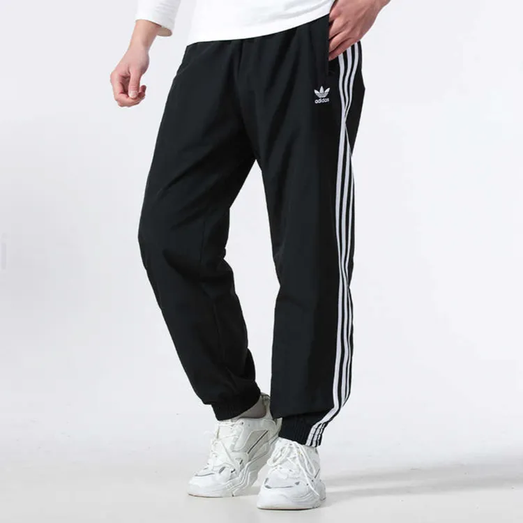 阿迪达斯男WOVEN FBIRDTP梭织束脚运动休闲裤KB2465