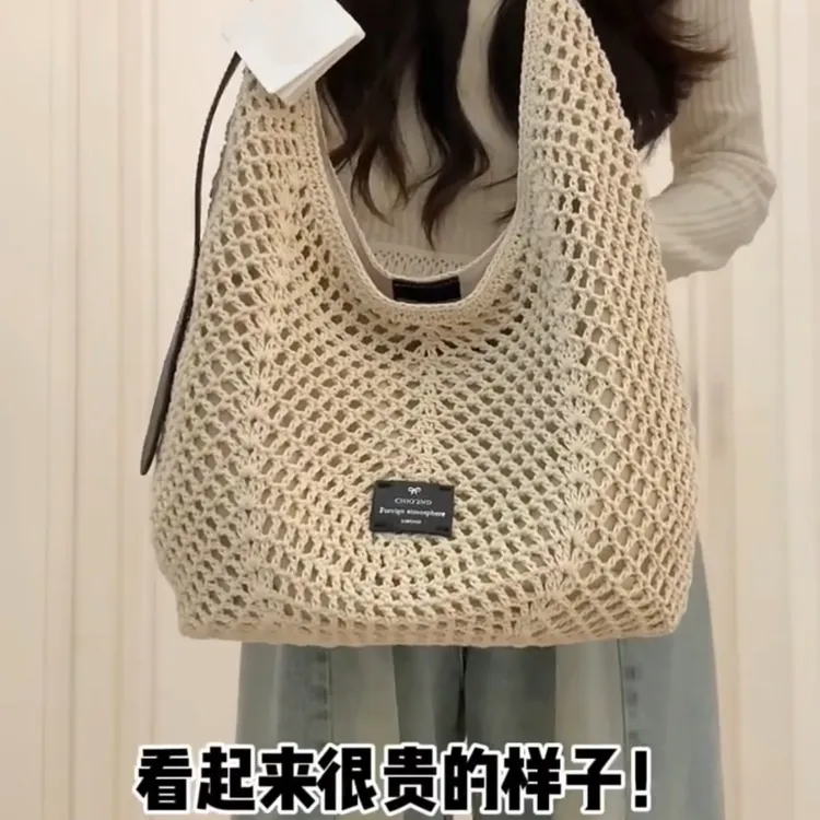 包包女式2026新款海边度假沙滩编织包大容量通勤百搭单肩水桶包