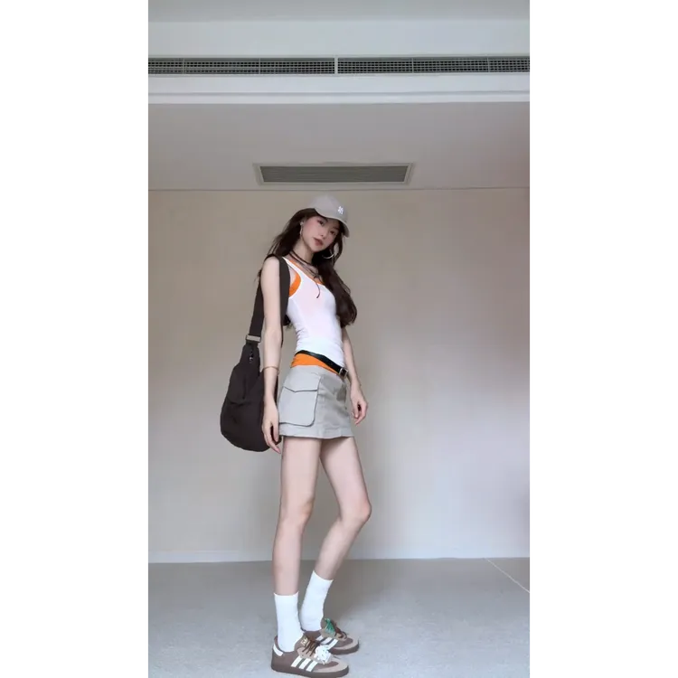 MARIE.COCO小众辣妹别致设计感假两件背心上衣搭配工装A字裙套装