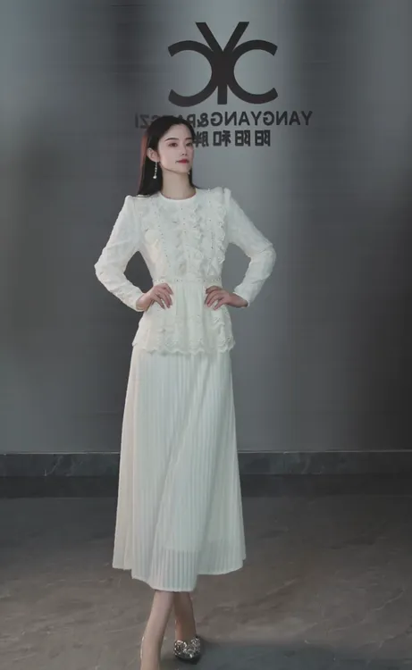 落雪暖杏105570小众设计师品牌轻奢优雅知性法式长袖仙气女神裙新