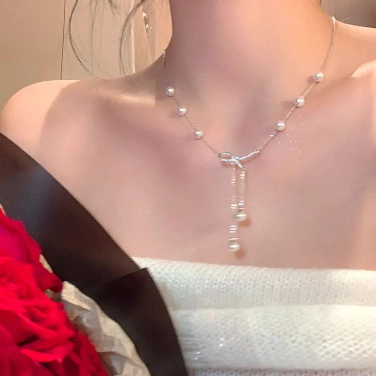 铜合金项链 蝴蝶结仿珍珠流苏项链女轻奢小众颈链高级感锁骨链潮 