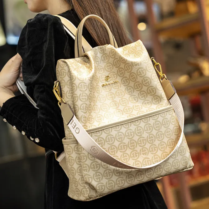 香港品牌戈兰黛2025真皮时尚休闲多功能大容量双肩包女士百搭背包