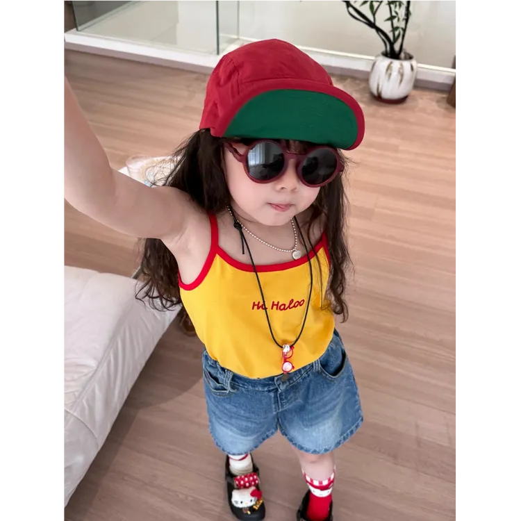 小惜亦女童2025夏季新款韩版夏日出游穿搭黄色吊带牛仔短裤套装