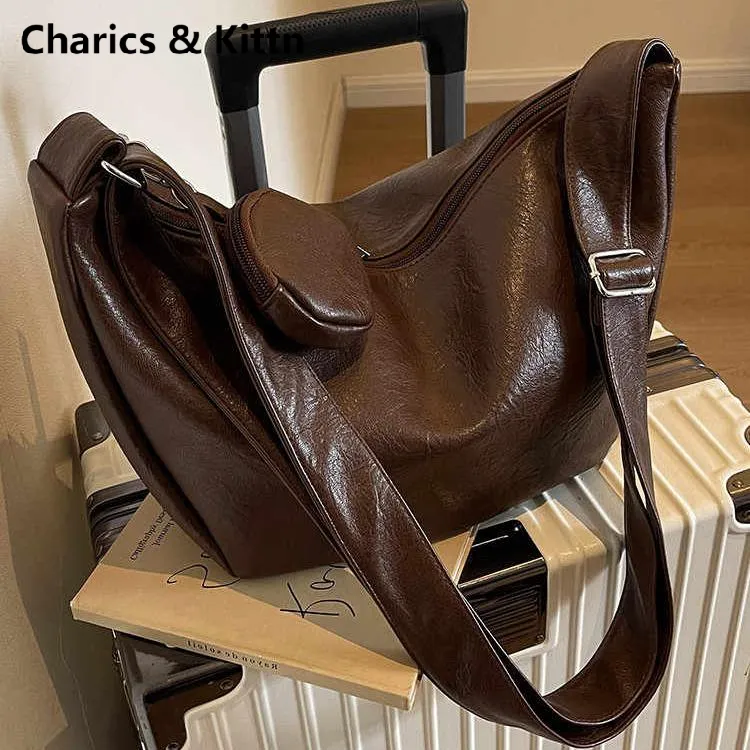 Charics&Kittn斜挎包包女款腋下女式2025新款通勤饺子真皮单肩包