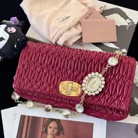 99新 MIU MIU/缪缪 思斯专属 缪缪红金褶皱包 THCN186