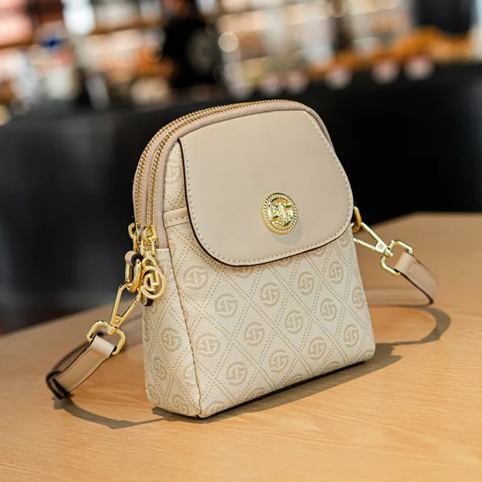 香港品牌戈兰黛正品真皮女士手机包时尚百搭印花单肩斜挎小包包