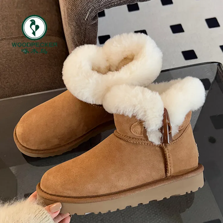 啄木鸟雪地靴女冬季新款皮毛一体牛角扣短靴防滑保暖加绒加厚棉鞋