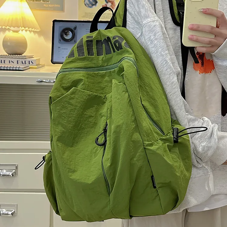 书包ins小众轻便防泼水高中生男女大容量运动户外双肩包旅行背包