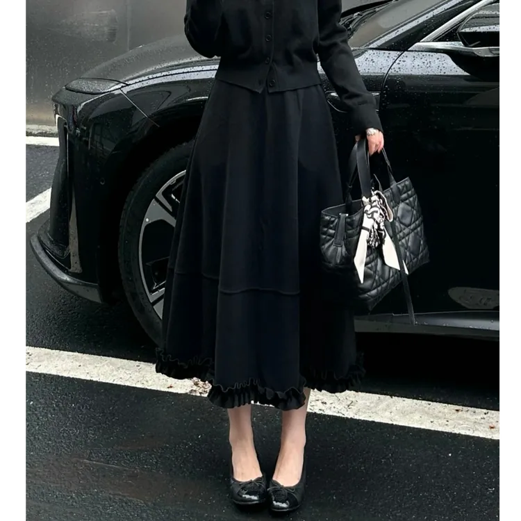 轻奢风法式时尚气质黑色半身裙2025秋季新款木耳设计拼接A字伞裙
