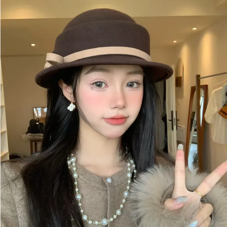 黑色不规则赫本风千金羊毛礼帽女2025新款贝雷帽显脸小渔夫帽盆帽