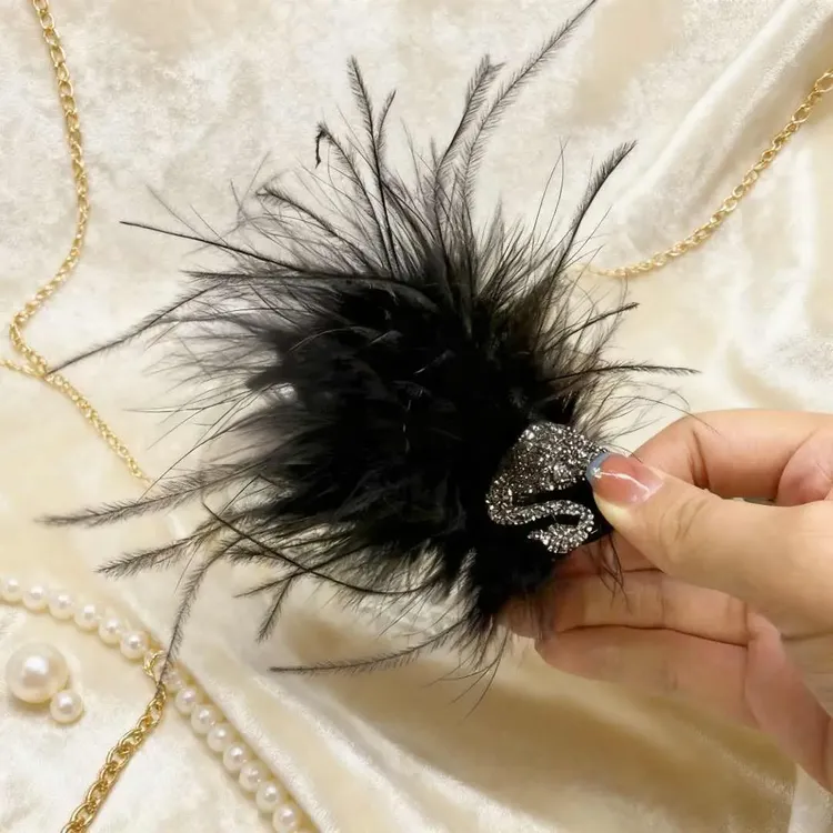 秋冬高级感 新款小天鹅羽毛抓夹丸子头丸子头