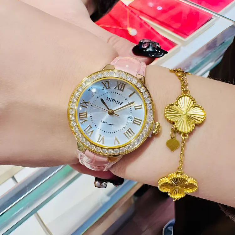 女士金表气球白色表盘镶钻石英机芯粉色表带防水时尚0.71克