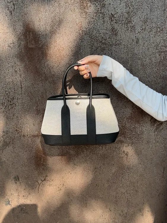 NIANLAI新款高级质感帆布配皮花园包简约百搭通勤手提包