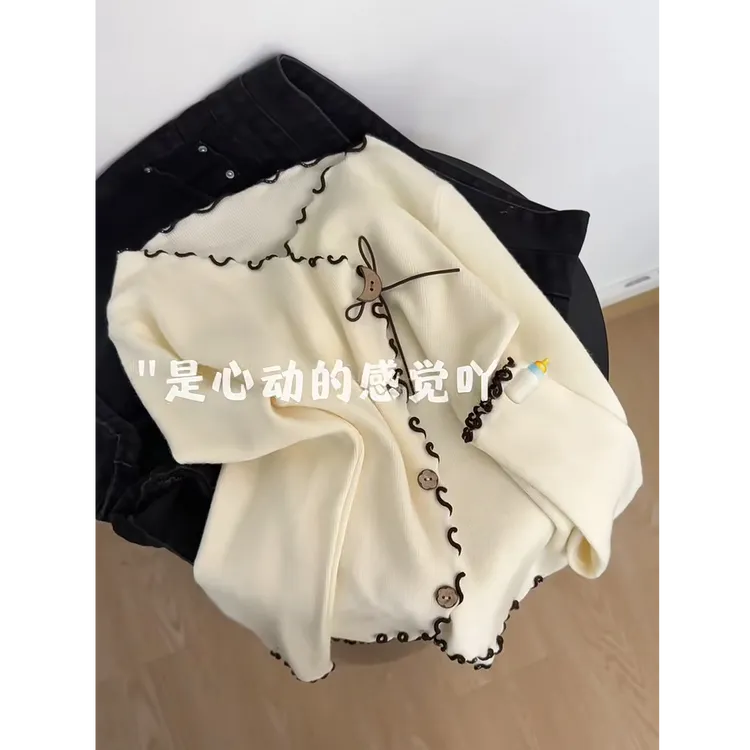 法式复古V领木耳边不规则针织开衫女2025年秋季修身收腰长袖上衣