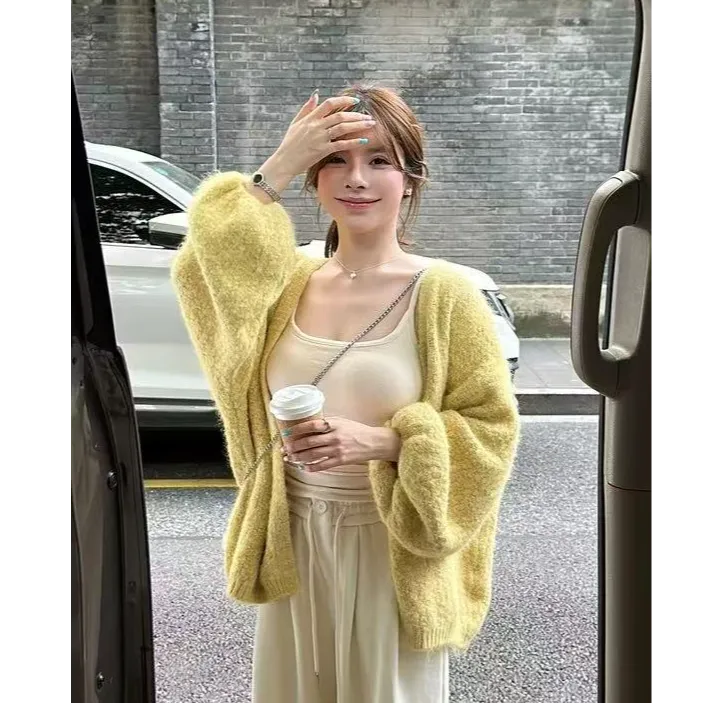 秋冬新款慵懒风宽松中长款泡泡袖设计感毛衣温柔百搭针织开衫女