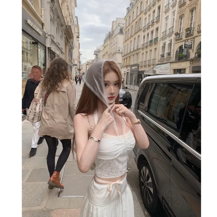 【南法情书】法式女神2025夏季新款白色挂脖吊带配减龄半身长裙套装