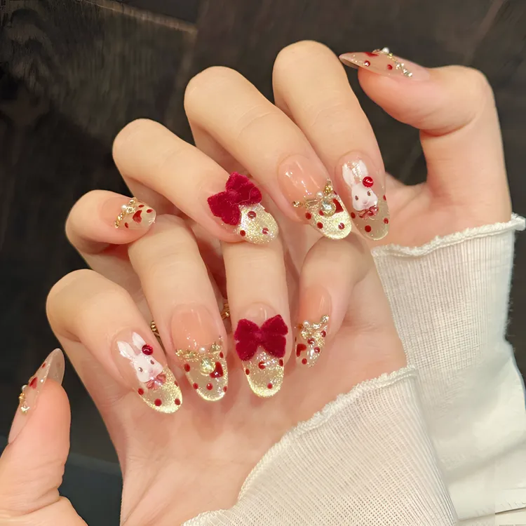 法式猫眼冰透纯手工穿戴甲高级感红色蝴蝶结爱心带钻美甲新年战甲