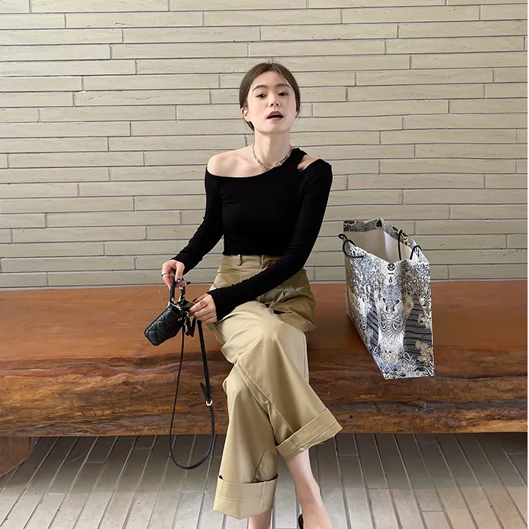 早春斜肩长袖T恤女2025春季螺纹棉弹力设计感镂空轻熟风百搭上衣