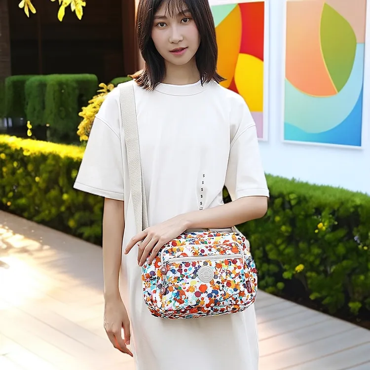 菲都狄都新款女士斜挎包时尚尼龙布包休闲防水牛津布女包个性印花