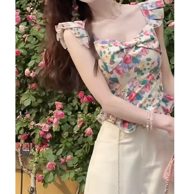 夏季温柔系穿搭女2025新款时尚设计感小飞袖碎花上衣阔腿裤两件套