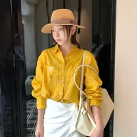 黄色亚麻衬衫女2025秋季薄款透气宽松防晒衬衣设计感休闲长袖上衣