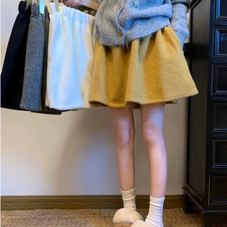 纯色松紧腰A字短裙女2025秋冬新款韩系减龄简约毛呢蓬蓬裙纯欲风