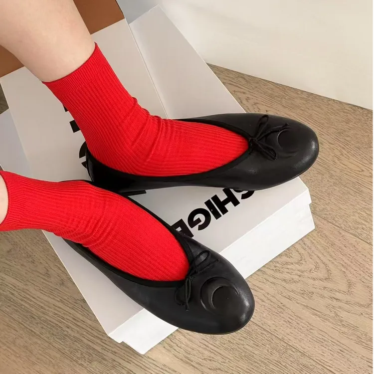 诗歌兰女鞋2025年新款真皮时尚蝴蝶结浅口休闲单鞋9063-601