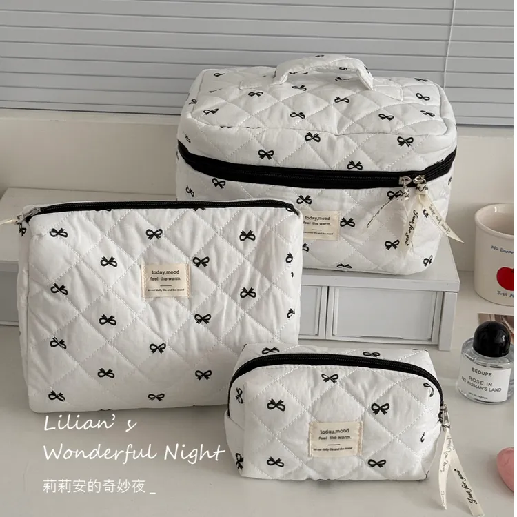 莉莉安高级黑甜美蝴蝶结化妆包高颜值大容量外出旅行便携式收纳包
