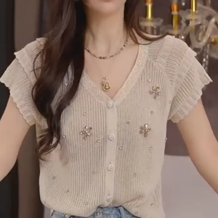 【南法夏日】2025夏季重工钉钻v领小镂空短袖针织衫LK2503690
