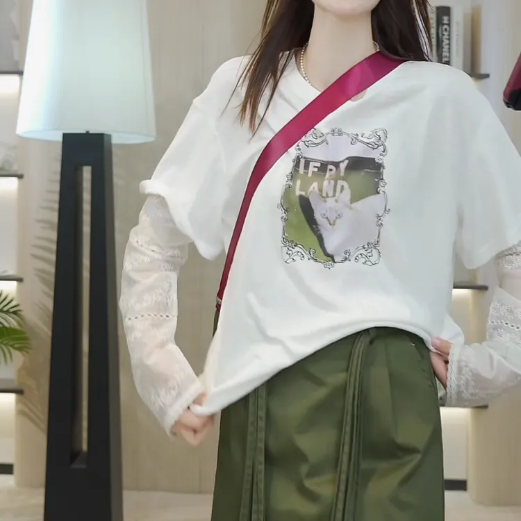 新款猫咪图案假两件拼接镂空网纱长袖T恤LK2503200