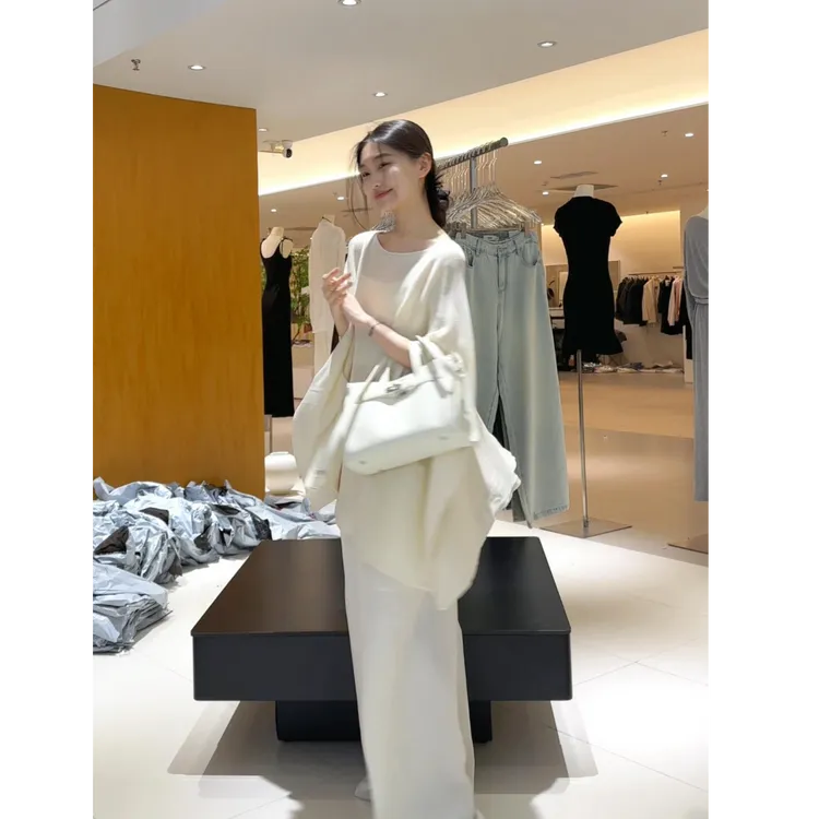 2025春秋新款时尚气质披肩针织斗篷不规则针织上衣搭高腰长裤套装