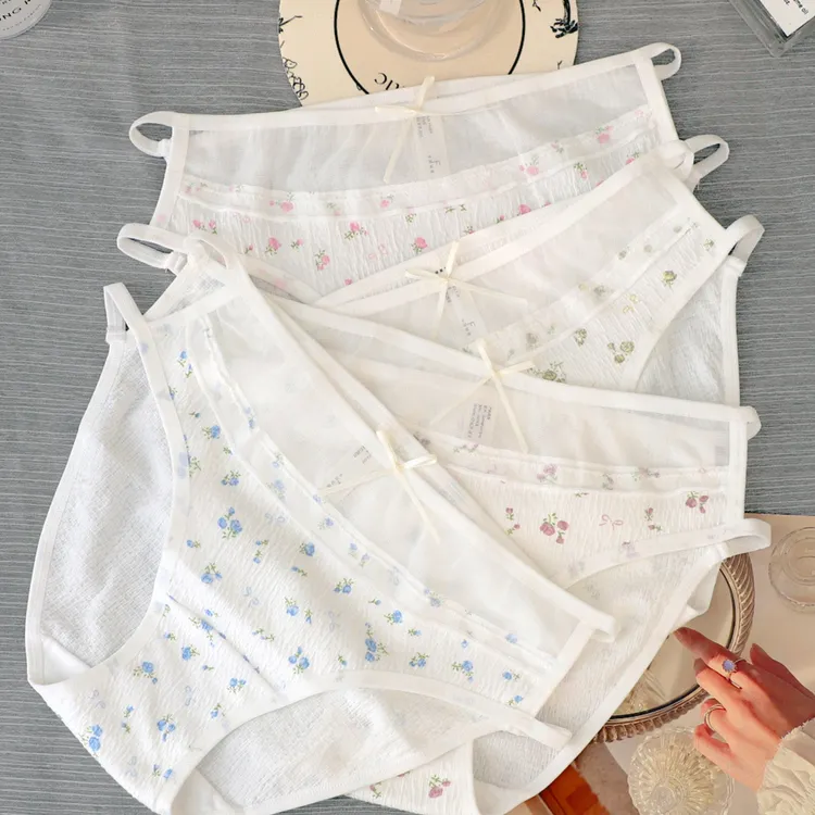 甜美印花高弹包芯氨亲肤棉网纱拼接时尚性感舒适少女中腰三角内裤