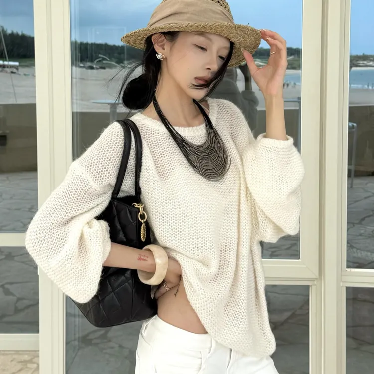 温柔慵懒氛围感宽松柔软镂空针织毛衣女2025秋季时尚圆领针织衫