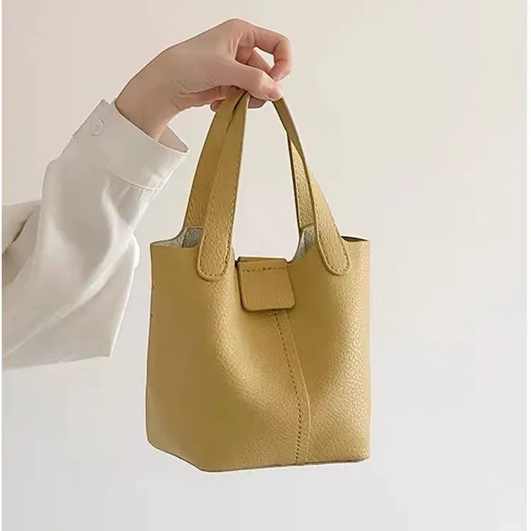 菜篮子女包2025新款潮时尚手拎荔枝纹韩系软皮手提小水桶包女斜挎