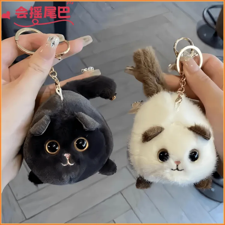 新款卡通可爱创意有趣的拉线会摇尾巴还会吱吱叫的小猫毛绒玩具