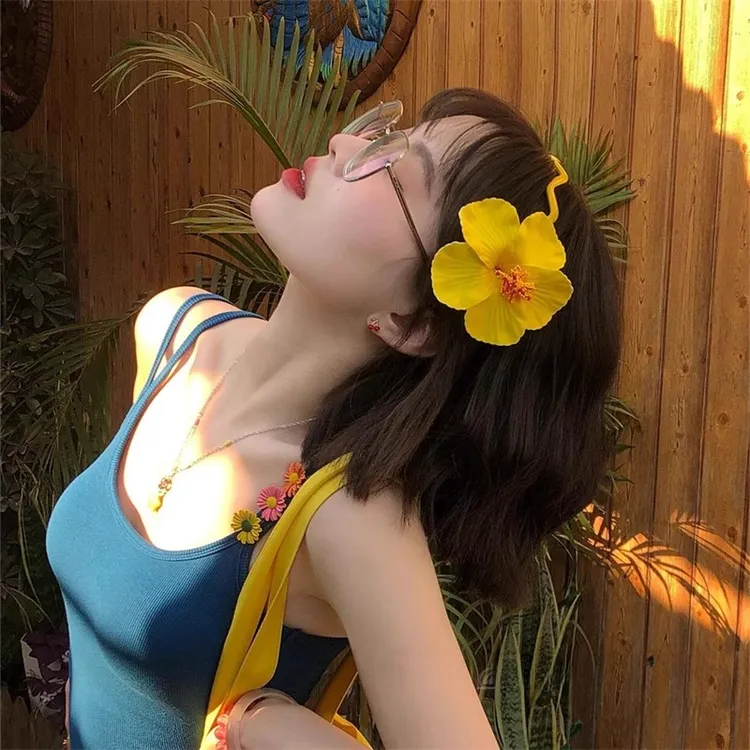 波西米亚黄色扶桑花发夹氛围感海边度假风仿真花朵侧边夹沙滩拍照