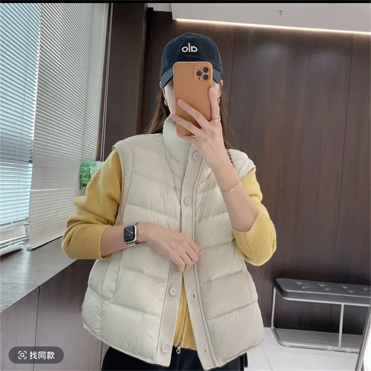 针织拼接羽绒马甲女外穿短款2025新款韩版宽松立领单排扣秋冬马夹