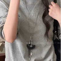 铜皮质项链 黑色皮质饺子吊坠项链女小众设计高级感毛衣链配饰潮 