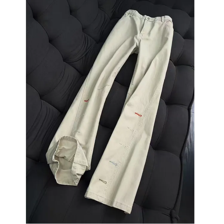 复古水洗纯棉斜切牛仔裤彩色刺绣扣眼男秋冬加绒直筒微喇工装裤子